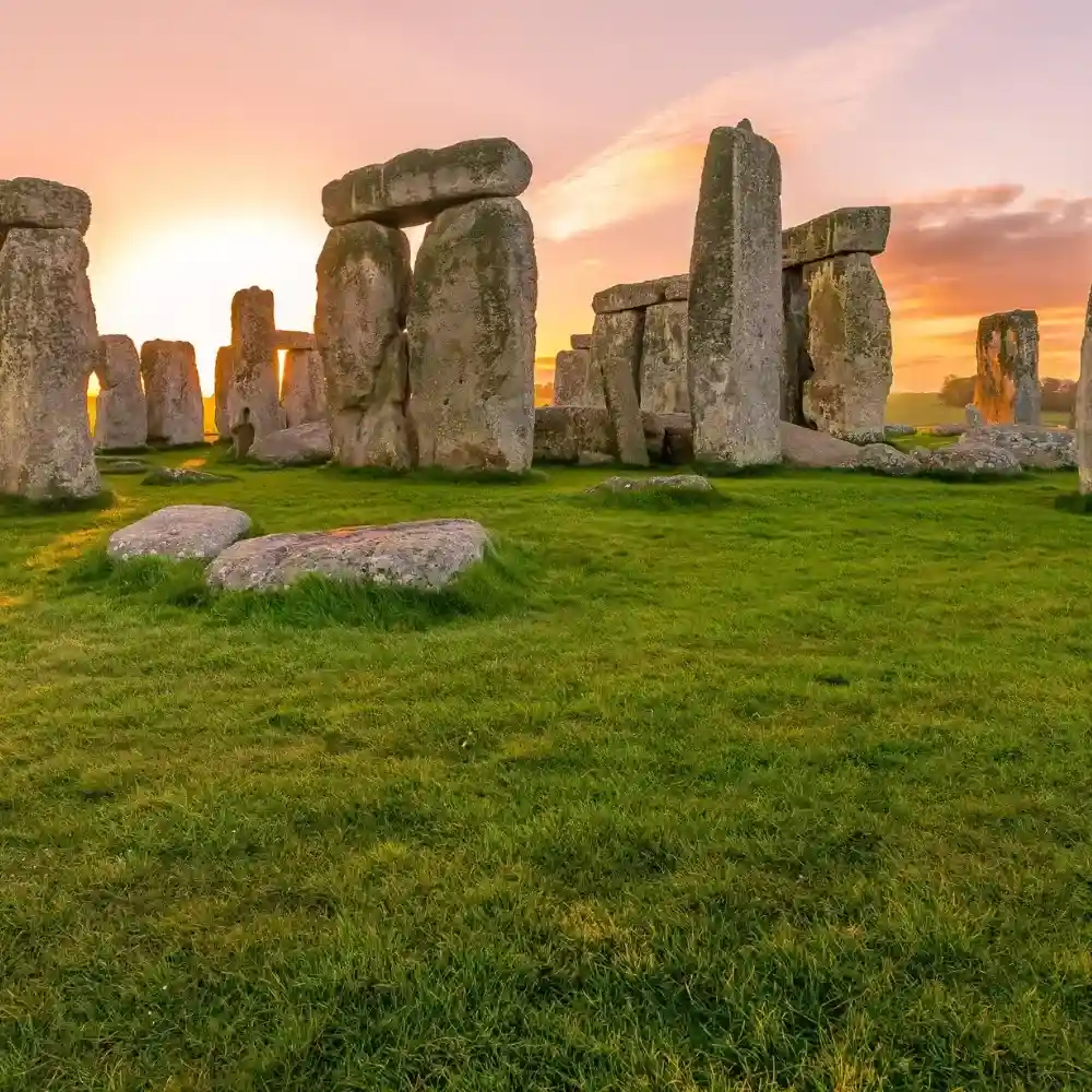 Ancient Stonehenge monument at sunrise, England.