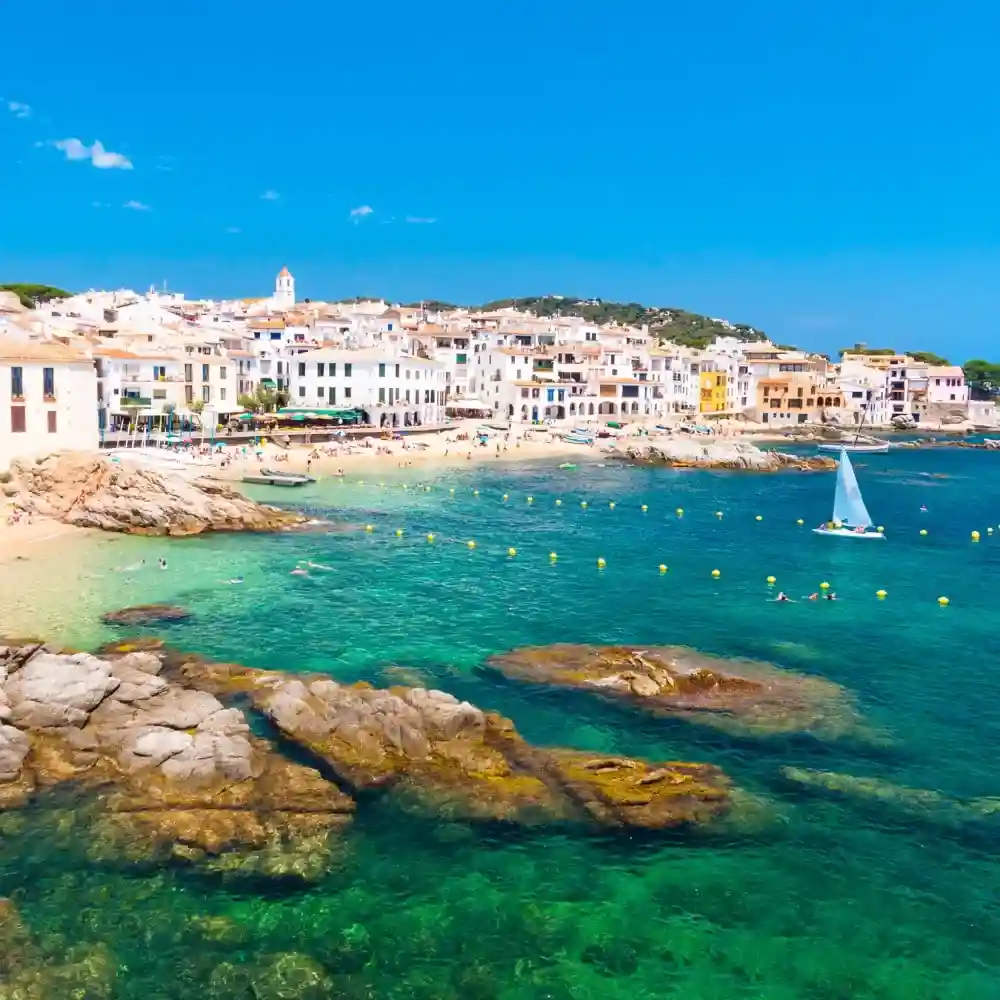 Costa Brava coastal landscape with beaches and cliffs.